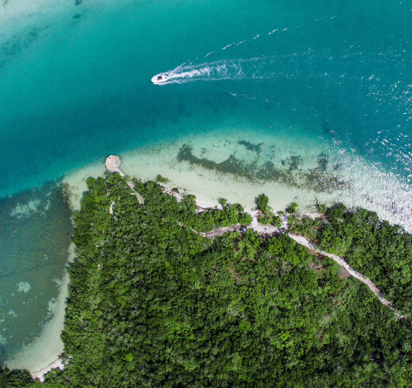 Aerial view Longboat Key intracoastal with boat.