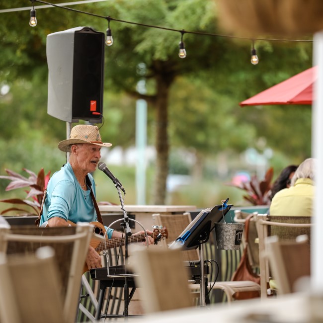 Restaurant with outdoor seating and live entertainment