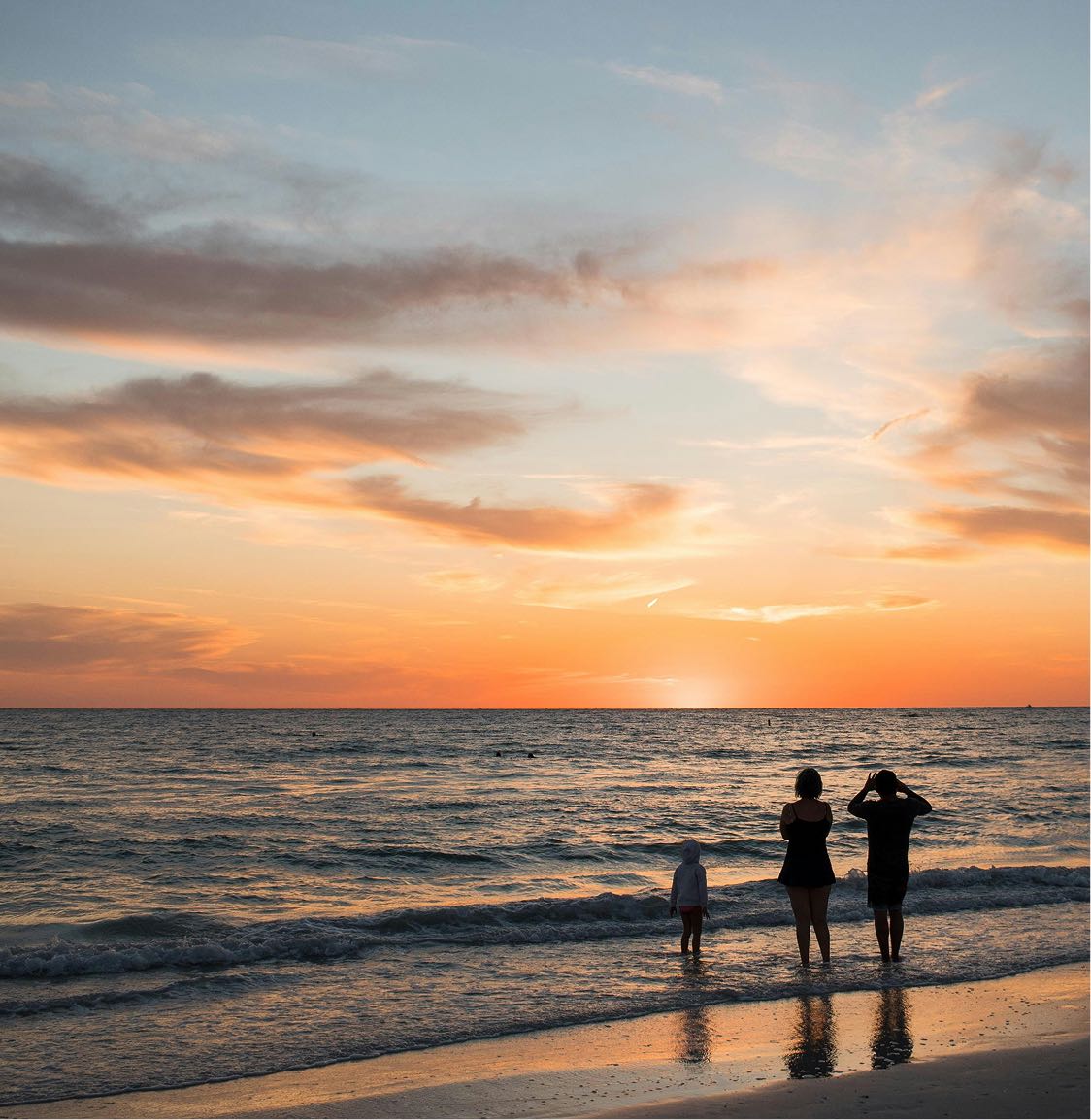 The sunsets on St. Pete Beach paint the Gulf skies in orange, pink, and gold.